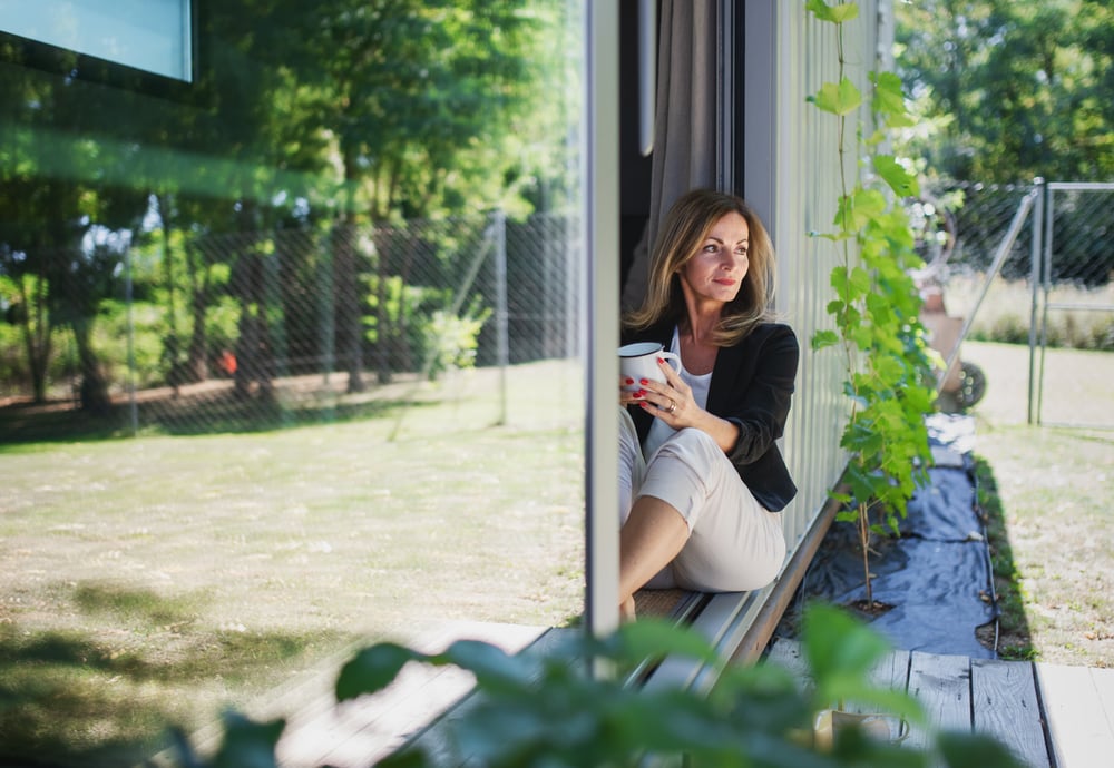 A mature middle age woman working from home