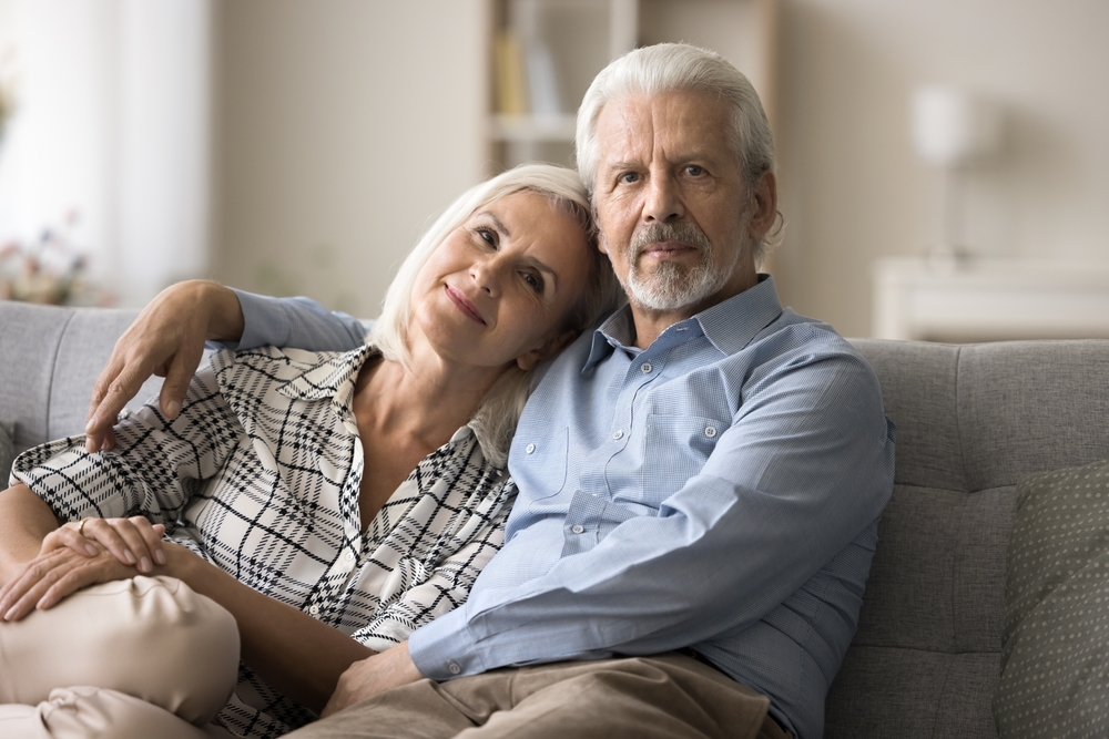 A retired older couple feeling a bit bored at home.
