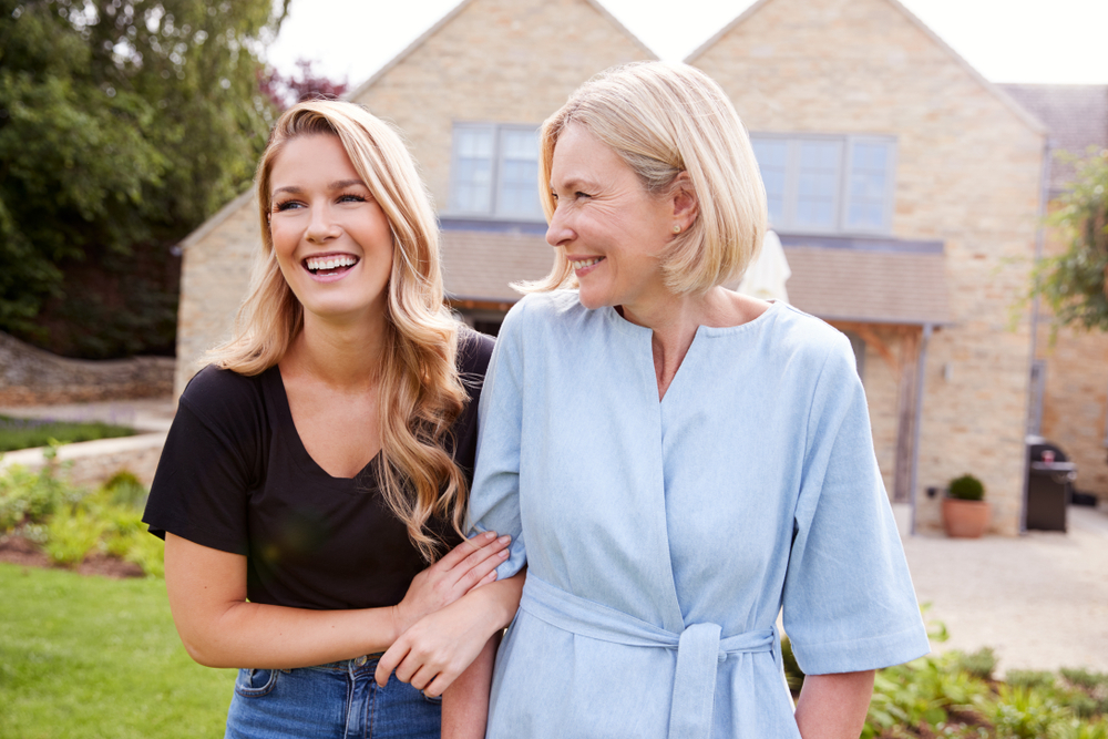 Senior mother and daughter out for a walk together.