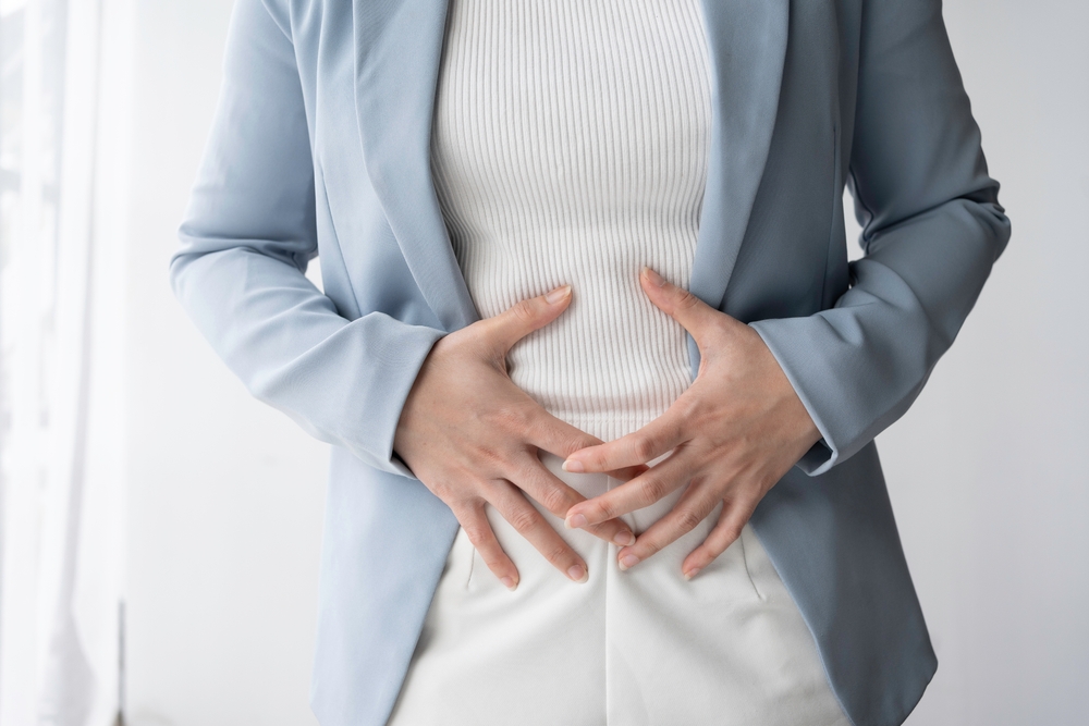 Woman with a stomach ache.