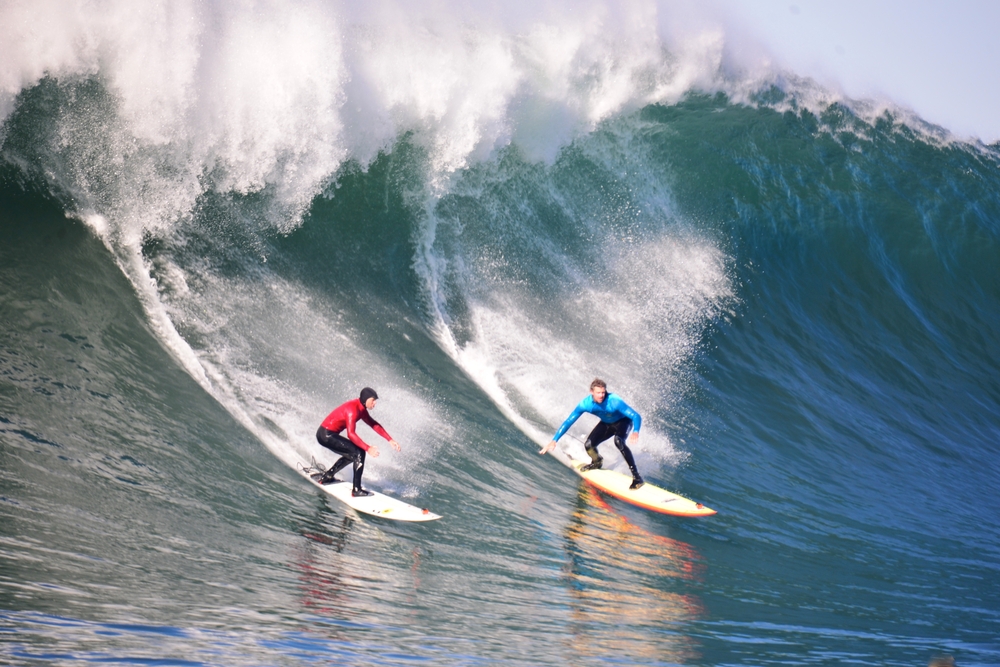 Two young surfers surfing in California