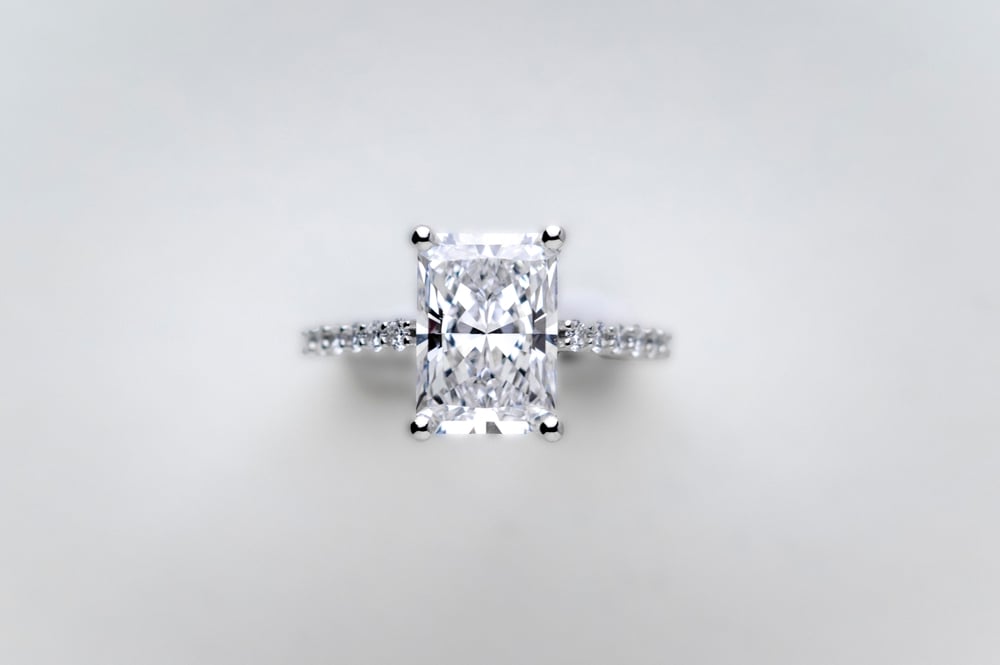 A luxurious square cut diamond engagement ring
