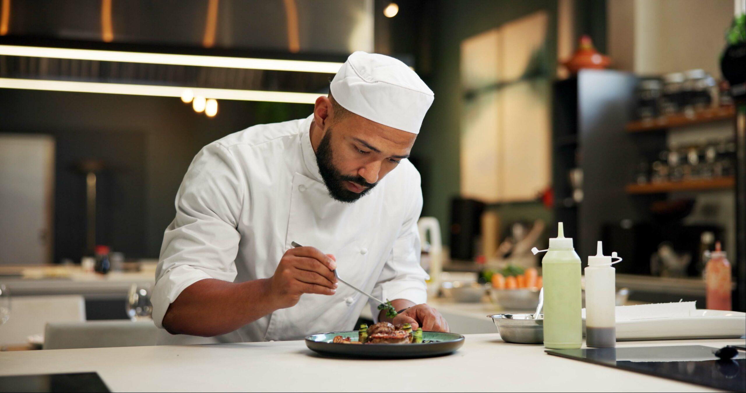 Professional chef in the restaurant kitchen.