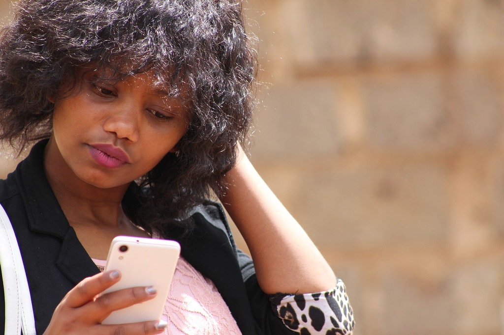 woman on phone confused frustrated