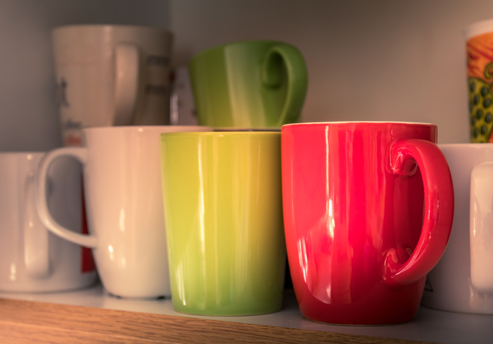 Assorted coffee and tea mugs.