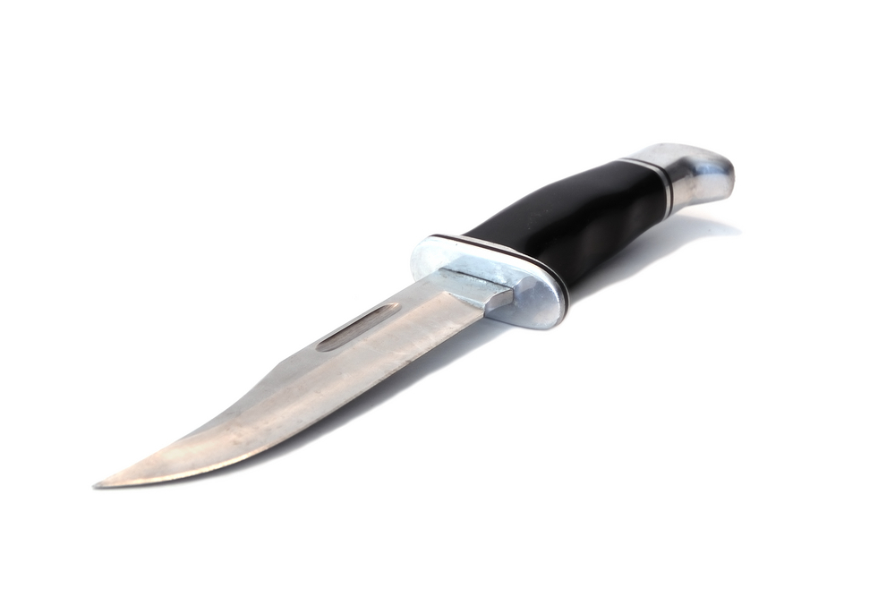 A knife with a black handle.