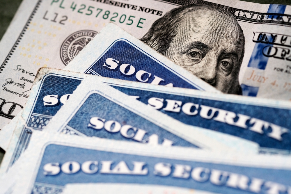 Social security cards and American dollars.