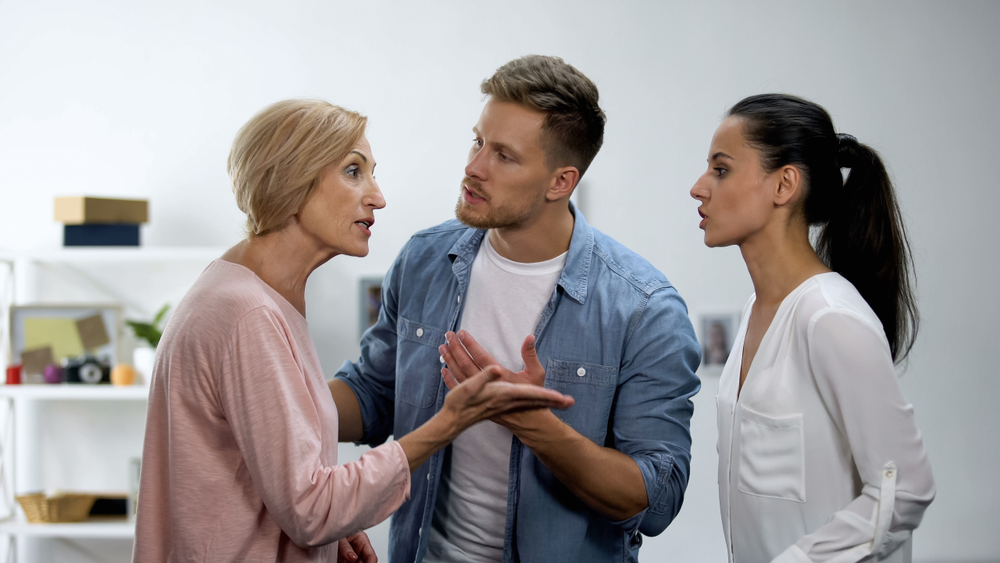 Couple arguing with a mother figure.