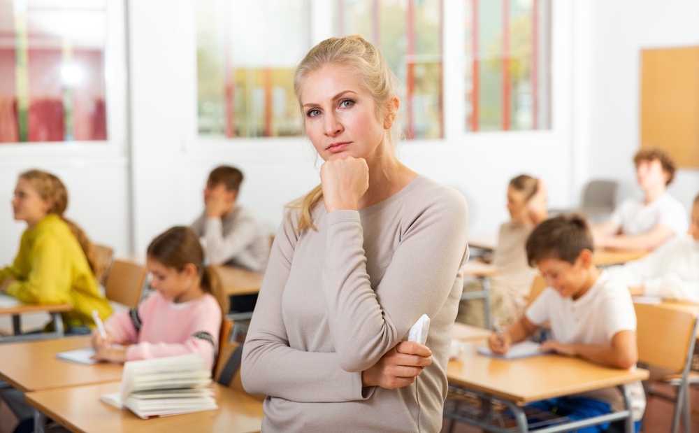 Teacher and students at school.