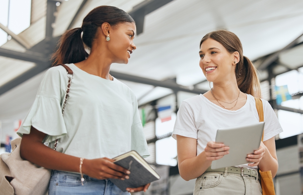 Two young ladies talking