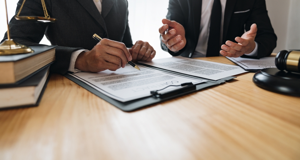 A legal advisor with his client. 