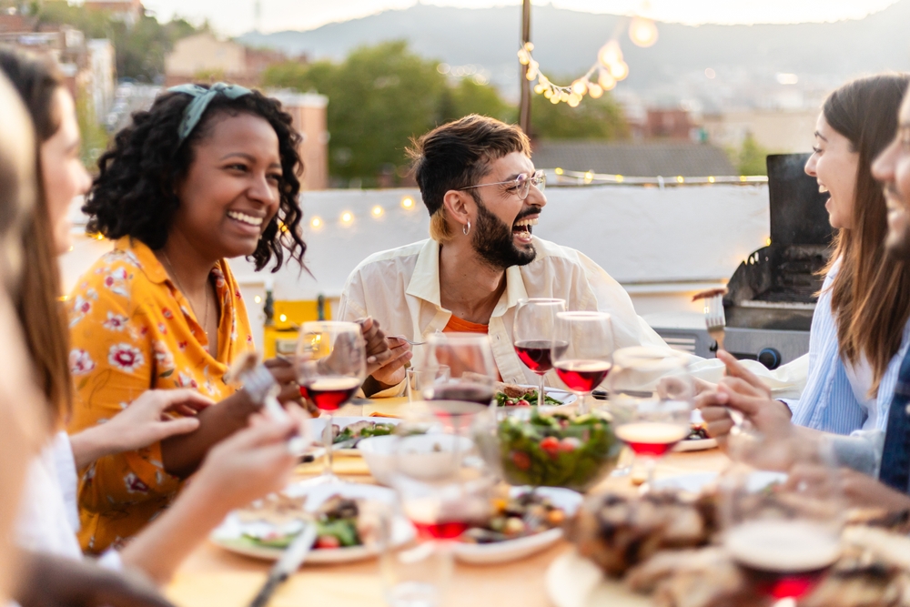 A group of friends having dinner outside