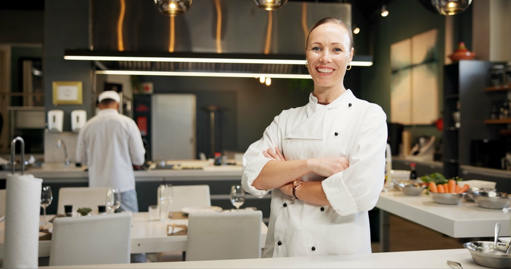 A woman chef in the kitchen.