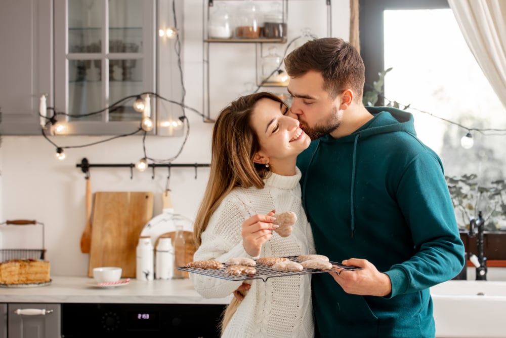 Young marriage couple hugging.