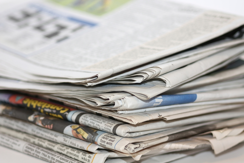 A pile of newspapers.