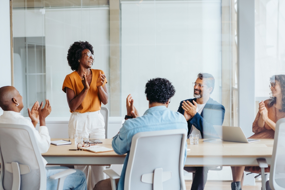 A group of business people in an office.
